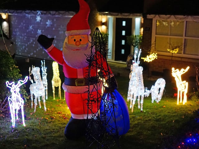 A wave hello from Santa and his reindeer.