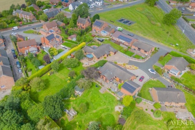 We close our gallery with two more aerial images, giving a revealing overview of the Green Farm Road bungalow.