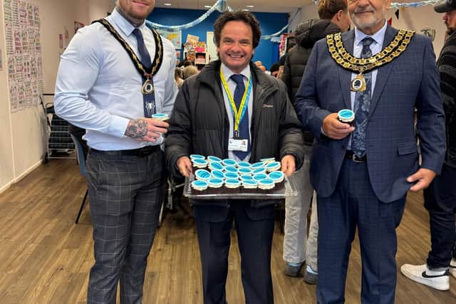 Simon Martin, Executive Leader at ATTFE College (centre) with Dale Grounds and Paul Grafton – Vice Chairman and Chairman of Ashfield District Council (left and right) with cup cakes from the College Butterfly Bakery