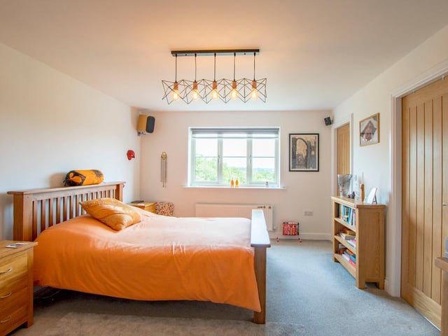 The master bedroom has a dressing room and en-suite.