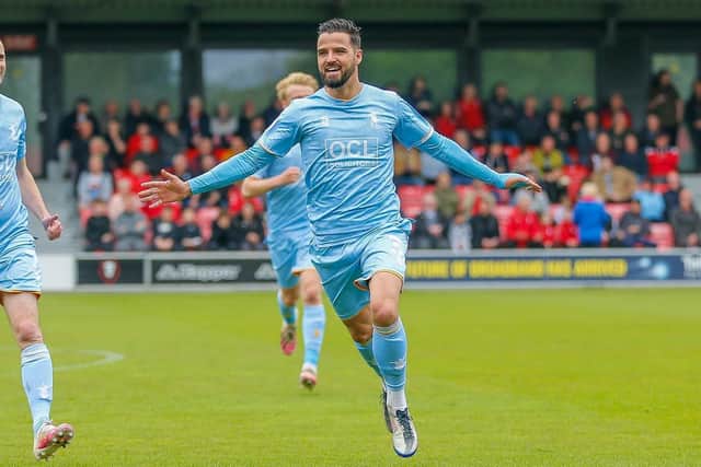 Mansfield Town left back Stephen McLaughlin celebrates a goal at Salford.