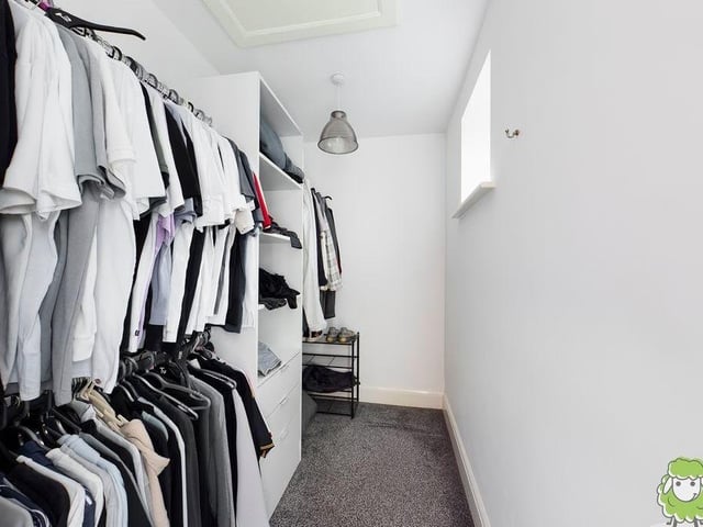 Two of the bedrooms have walk-in wardrobes. This is the one for bedroom number four on the second floor.