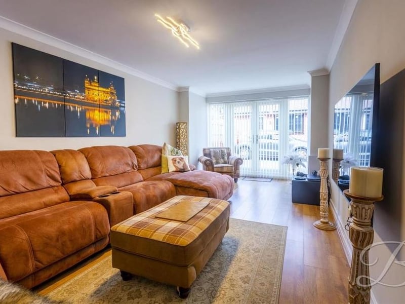 Here is an additional living space or lounge that could be put to multiple uses. French doors lead outside to the front of the house for extra convenience.