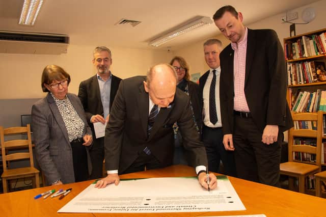 NGO leaders at the conference signing the Sherwood Accord. Photo: Philip Formby