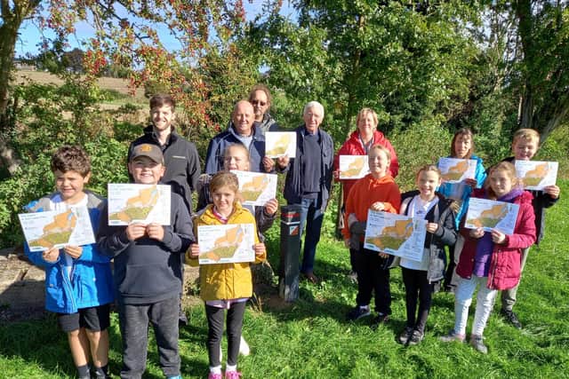 Children from Church Vale Primary School undertaking the orienteering course with Geoff Waller, former chair of Mansfield District Leisure Trust.