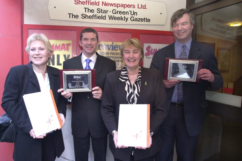 Pictured at the Star Offices York Street, Sheffield, where plaques were presented to the winners of the Star's Children mean Business  awards in February 2001. Seen LtoR are,  Dawn Revill, Jason Feeney from the Sheffield Benifits Agency, Margaret Goodlad project Manager for the Children Mean Business scheme  who made the presentation, and Ian Greenaway of MTM Products, of Chesterfield.
