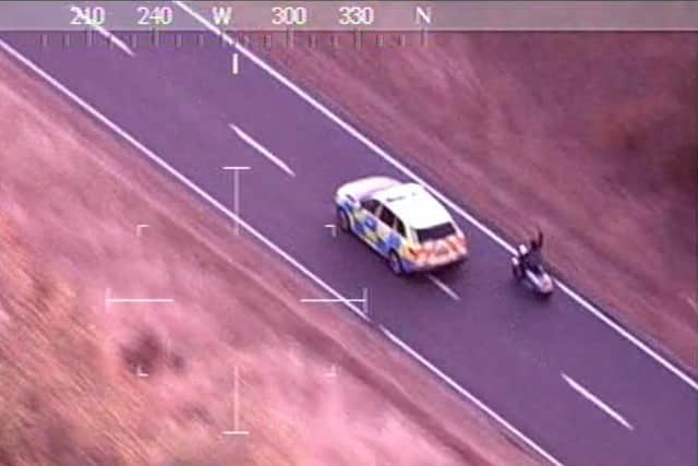 The masked rider of a stolen moped was pursued through Clifton and brought to a safe stop by the crews of two armed response vehicles.
