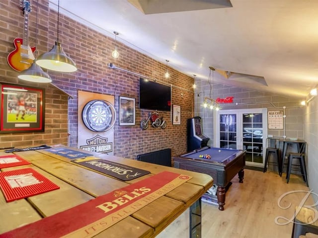 An ideal games room with brick wall surrounding, central heating radiator, access from the front and patio doors to the rear.