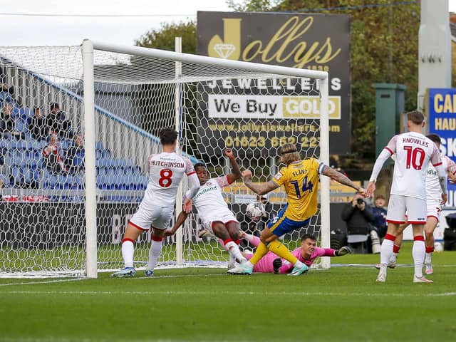 Aden Flint opens the scoring for Stags during the Sky Bet League 2 match against Walsall  FC at the One Call Stadium, 28 Oct 2023
Photo credit - Chris & Jeanette Holloway / The Bigger Picture.media