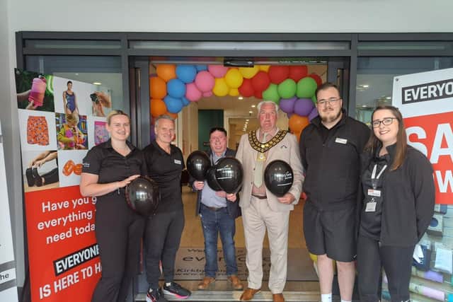 ADC Chairman Arnie Hankin and Councillor Jamie Bell with the team from Kirkby Leisure Centre