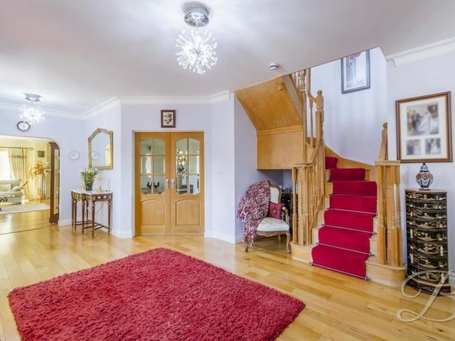 A return to the bright and welcoming entrance hallway signals that we are about to move upstairs. This space is fitted with solid oak flooring, a cupboard for extra storage and also a door providing access to the double garage.