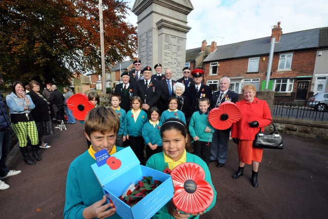 Pupils, Josh Oliver and Yaneek Allen give their support to the Kirkby branch of the Royal British Legion during their launch of the annual poppy appeal in 2012.