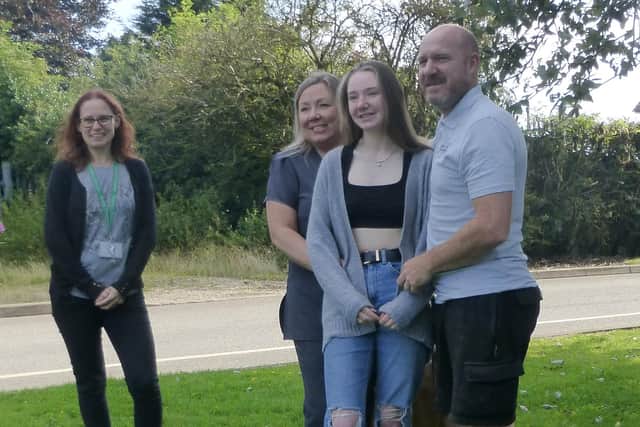Isobelle Lowe is picture with her delighted parents and Ashfield’s Head of Law, Mrs Amelia Fraser, looking proudly on.