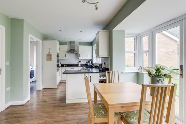 This photo shows all of the kitchen diner in its full glory at the £325,000 property. In total, there are five uPVC double-glazed windows to the side and rear of the house.