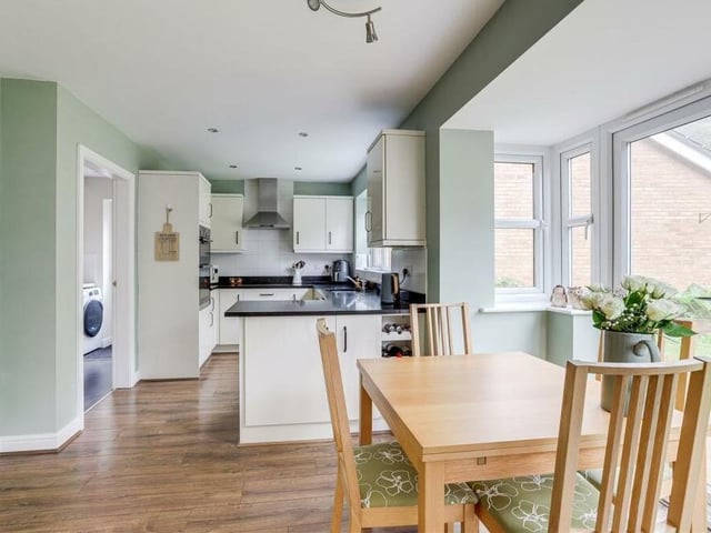 This photo shows all of the kitchen diner in its full glory at the £325,000 property. In total, there are five uPVC double-glazed windows to the side and rear of the house.