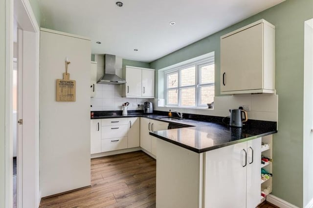 Next stop is the kitchen diner, which boasts a range of modern, fitted base and wall units with worktops. There is an integrated double oven, ceramic hob and extractor fan, and an under-mounted sink with stainless steel mixer tap and drainer.
