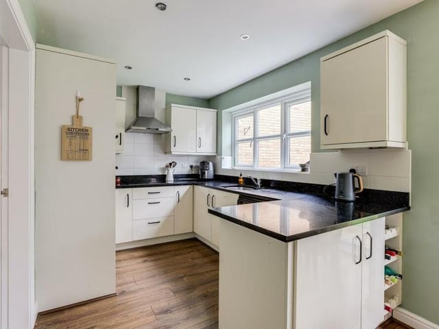 Next stop is the kitchen diner, which boasts a range of modern, fitted base and wall units with worktops. There is an integrated double oven, ceramic hob and extractor fan, and an under-mounted sink with stainless steel mixer tap and drainer.
