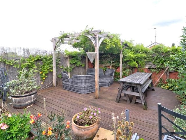 A closer look at the decked seating area in the back garden, which is a lovely spot in the summer for relaxing or entertaining friends.
