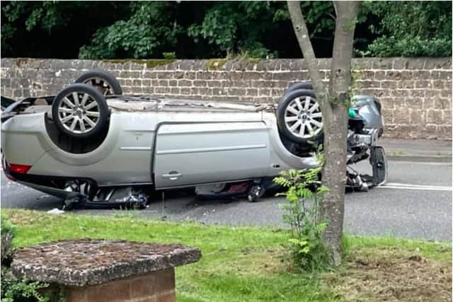 The overturned car in Lichfield Lane. (Photo: Carolyn Perry).