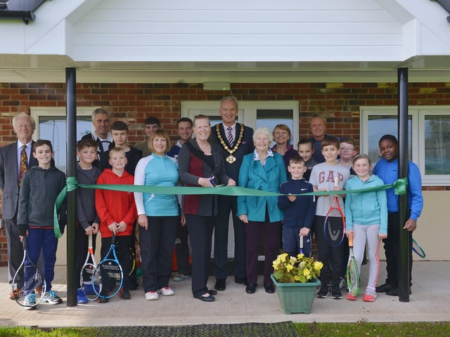Official opening of Mansfield Lawn Tennis Club new Club house. Pictured cutting the ribbon is Coun Joyce Bosnjak and County Council Chairman Coun Kevin Rostance with Club Chairman Sharon Cox-Smith, club President Sally Beeley, club members and tennis associations representatives