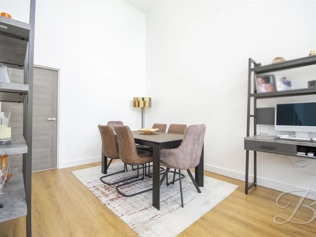The open-plan kitchen, living and dining area, is a bright and sociable space ideal for family life or entertaining