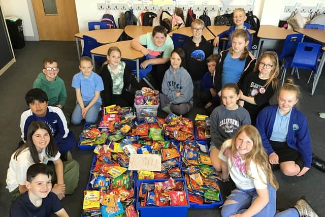 Pupils collected more than 1,000 crisp packets, which will be turned into blankets for homeless people.