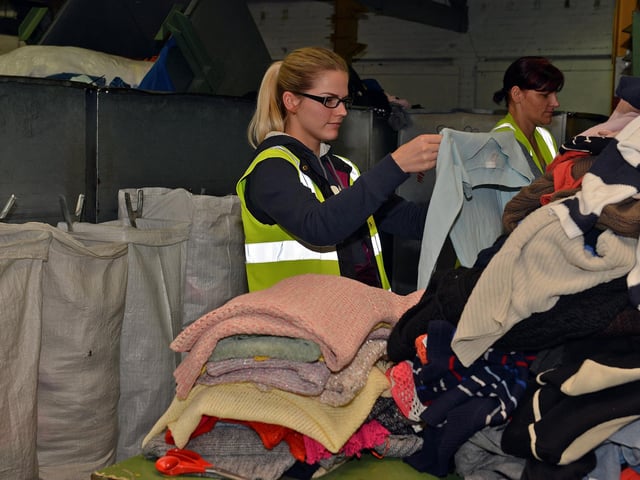Skilled textile collectors weighed the clothing items collected and separated items into categories.