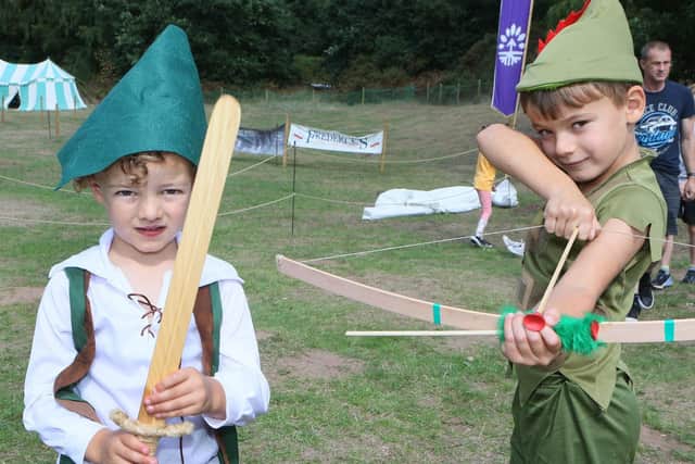 Cousins Ernest Nelson and George Petrucci in full Robin Hood mode at last year's Nottinghamshire Day event. (PHOTO BY: Jason Chadwick/National World)