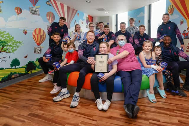 First team players at Mansfield Town Football Club helped spread Easter cheer by delivering chocolate eggs to poorly children at King’s Mill Hospital