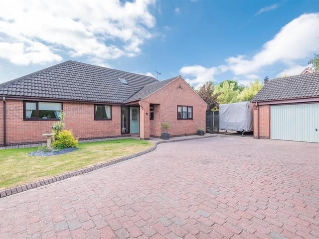 An individually designed five bedroom detached chalet bungalow offering versatile living accommodation over two floors, situated in a south facing private gated position with a large block paved driveway and detached double garage.