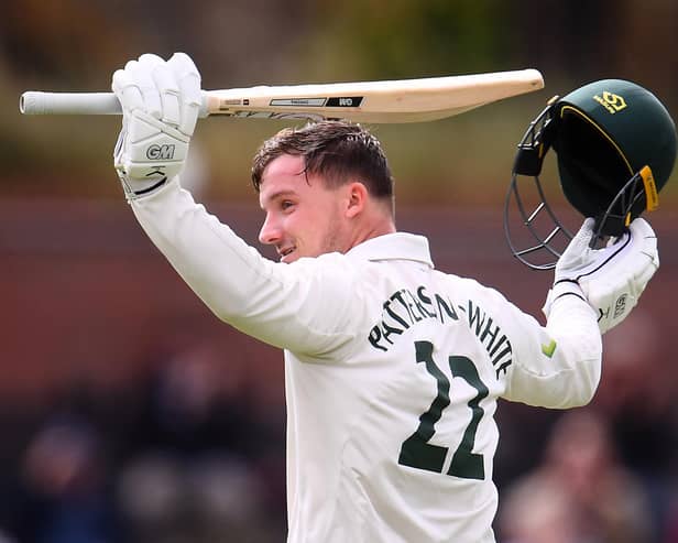 Liam Patterson-White of Nottinghamshire celebrates after reaching his century. (Photo by Harry Trump/Getty Images)