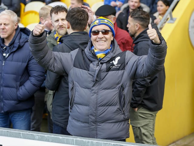 Mansfield Town fans ahead of kick-off against Rochdale on 10 April 2023.