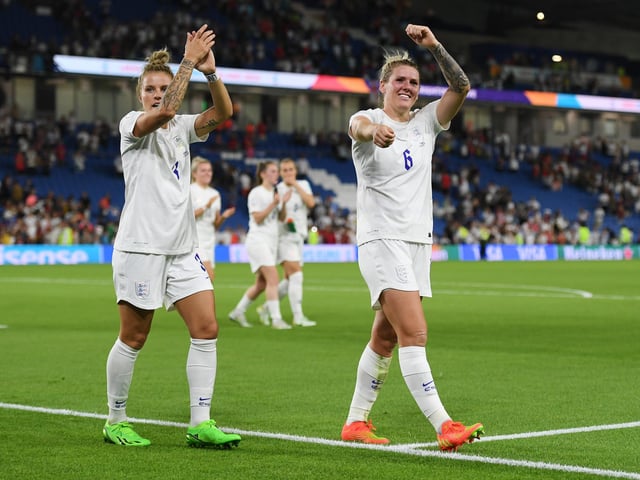 Rachel Daly and Millie Bright acknowledge the fans after their side's.
