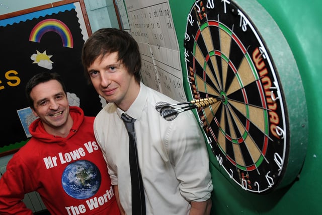 Steve Lowe, of Kingfisher Primary School, took on Free Press reporter Paul Goodwin in a darts match to raise money for Sport Relief in 2014