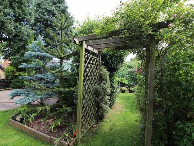 The garden at the £425,000 cottage is full of charming features. Here's one.......