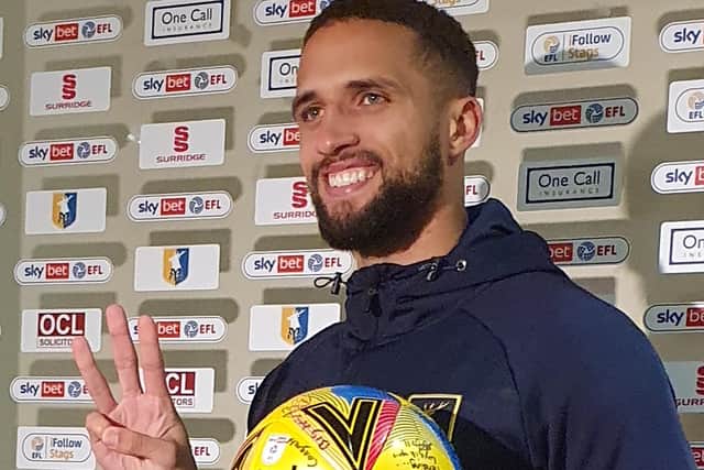 Bowery celebrates with his match ball.