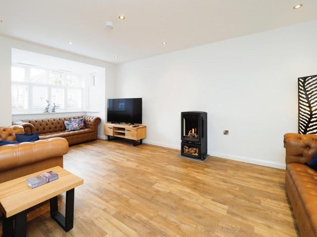 Luxury can be found in every corner of the Wildflower Rise property, and nowhere more so than the lounge, with its feature log burner.