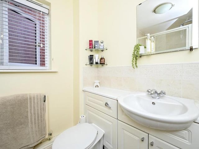 The master bedroom has its own en suite facilities.