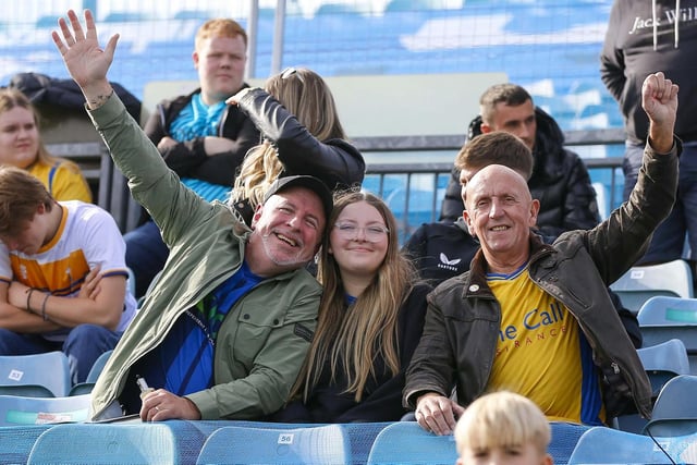 Mansfield Town fans watch the 1-1 draw at Gillingham.