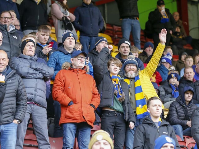 Travelling Stags fans watch the Sky Bet League 2 match against Bradford City.