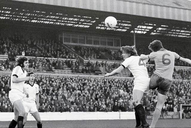 Kevin Bird wins a header against Shrewsbury in 1978.