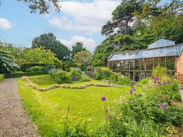 The garden is a gorgeous sight and complements the house so effectively.