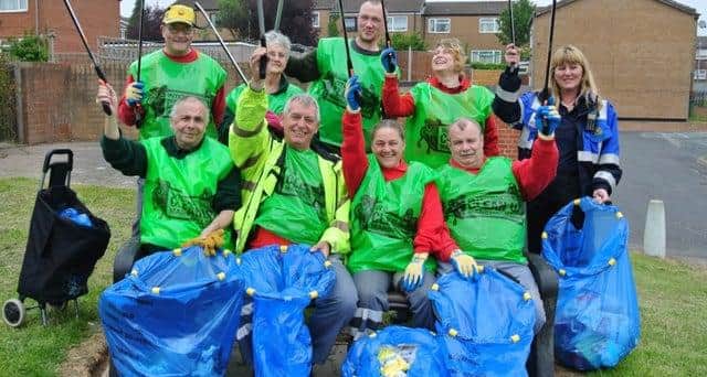 How some Mansfield residents took part in a previous Clean Up Day.