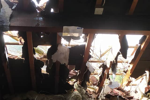 The roof was battered and water is now leaking into many of the rooms.