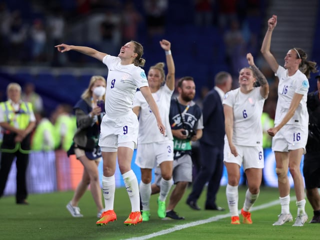 Ellen White celebrates with the fans.