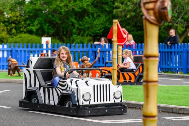 Children enjoying Monkey Mayhem Driving School