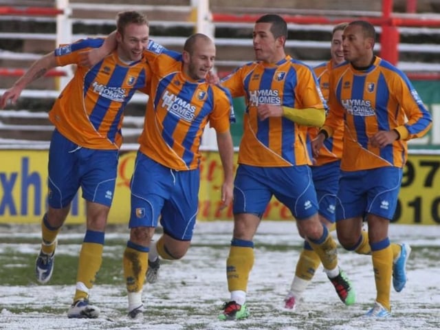 Mansfield celebrate Paul Connor's goal.
