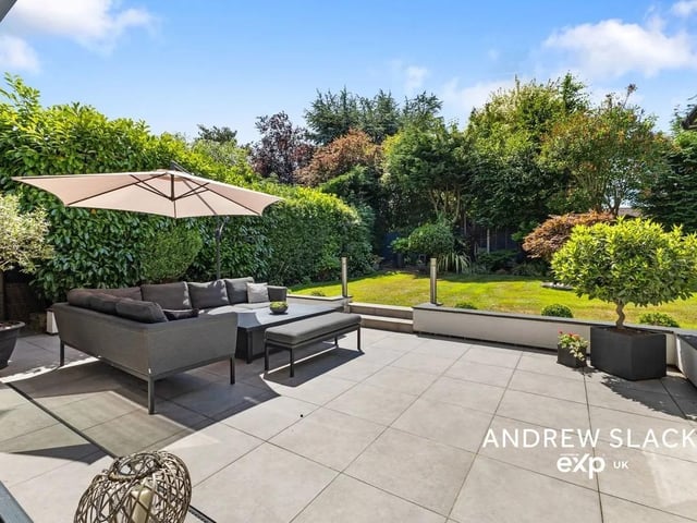 The stunning manicured garden is the perfect place to enjoy family BBQs or host guests.