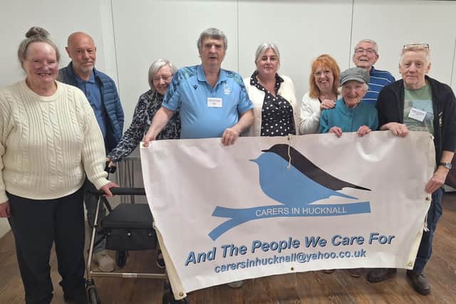 Michelle Welsh MP with founder Jim Radburn and members of Hucknall Carers. Photo: Submitted