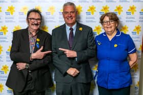 MP Lee Anderson with Paul Chuckle and a Marie Curie nurse.